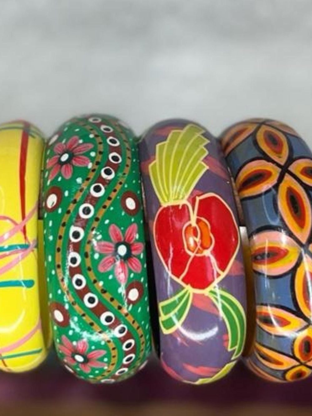 Hand-painted wooden floral bangle set
with floral